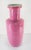 We are selling this extremely rare pink ground Chinese vase. This vase is in the Rouleau form with beautiful proportions...
