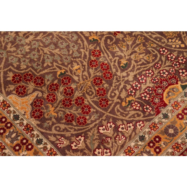 Designed with mesmerizing intricacy and gorgeous color palette, this hand-knotted masterpiece demonstrates the beauty and...