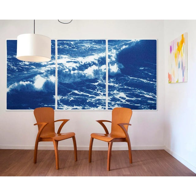 This is an exclusive handprinted limited edition cyanotype. This blue and white triptych shows vigorous waves in Bells...