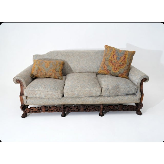 Elevate your living space with this stunning vintage sofa, embodying the opulent charm of Victorian revival design....