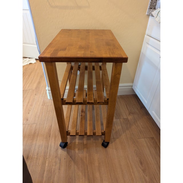 Solid wood kitchen cart made in the USA in 1994.