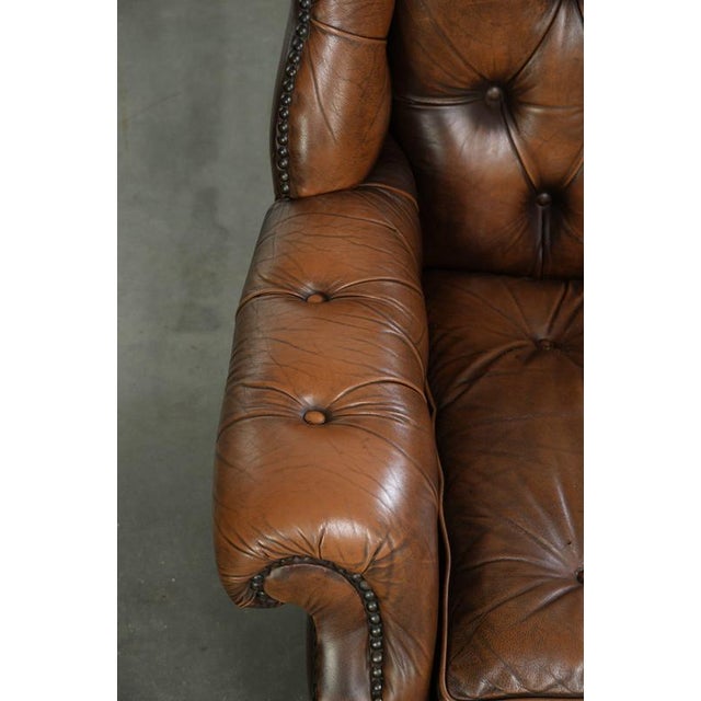 Animal Skin Vintage English Cowhide Chesterfield Wing Armchair For Sale - Image 7 of 13
