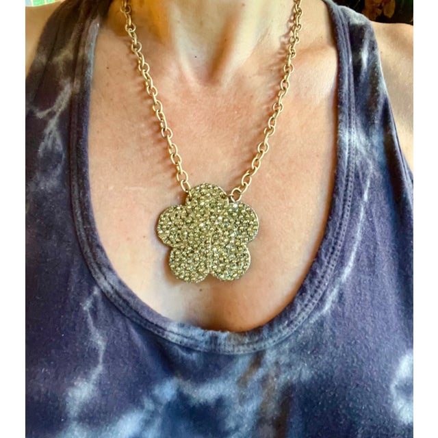 Super sparkly Champagne toned Swarovski crystal pendant necklace by Toni Blonshay. Constructed in warm gold-plate metal...