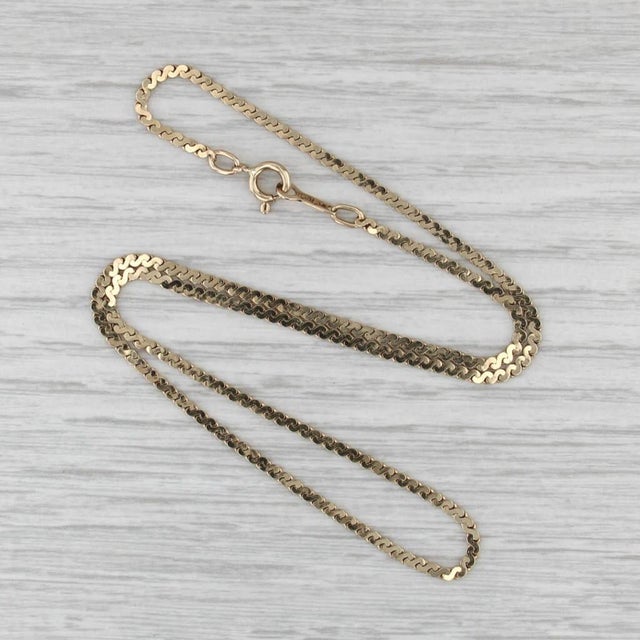 Metal: 14k Yellow Gold Weight: 4.1 Grams Stamps: 14k Chain Style: S-Link Chain Closure: Spring Ring Clasp Length: 15 3/4"...