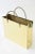 This vintage shopping bag sculpture and or magazine holder has braided handles. It is from the 70's. It was just polished...
