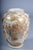 Antique Japanese Satsuma vase from the Meiji period (late 19th to early 20th century), traditionally hand-painted and...