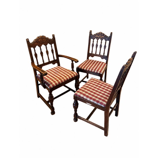 Steeped in old-world character, this rare complete set of six dining chairs by the storied Drexel Furniture Co. of...