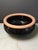 This Vintage Mid-Century Modern Black Glazed Terra-Cotta Bowl is a handmade piece of art pottery from Portugal. The round...