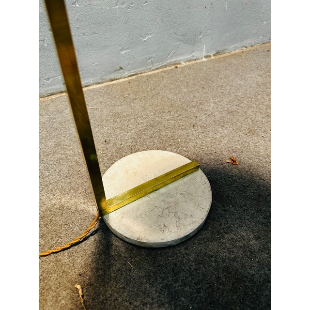 Suspended brass and opaline glass floor lamp - Italy, 1960s Fascinating vintage floor lamp dating from the 1960s, made...