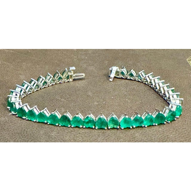 This exceptionally Beautiful Tennis bracelet has 36 stones of Heart shape Emeralds . Total weight of the Emeralds is...