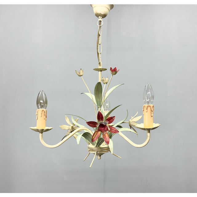 Mid-century floral chandelier made of metal. Produced in France in the 1970's. US wiring compatible. Bulbs: 3x E14 Up to...