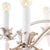 The Francie Chandelier adds a whimsical note to any design with slender leaves, flower petal bobeches and quartz crystal...