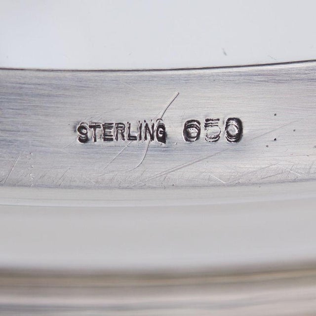 A unique Japanese liqueur set combining the transparent lightness of glass with exquisite filigree craftsmanship in 950...