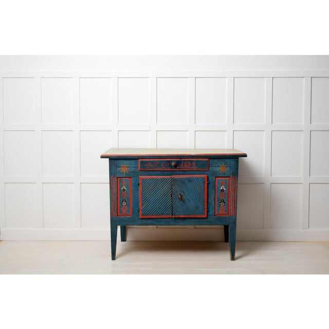 Rare antique Swedish sideboard. The sideboard is unusually low and made in gustavian style. It is an authentic country...