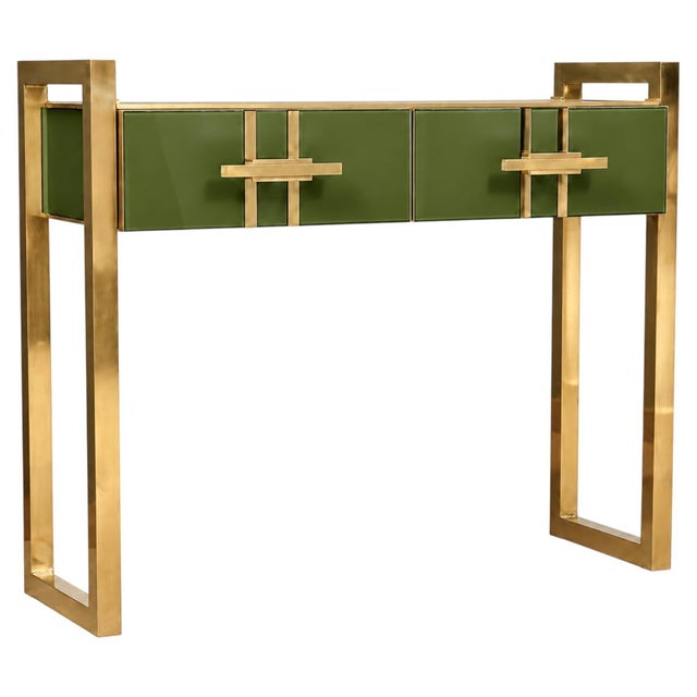 This Italian entryway console table in olive green Murano glass and brass is handcrafted to order as a contemporary piece....