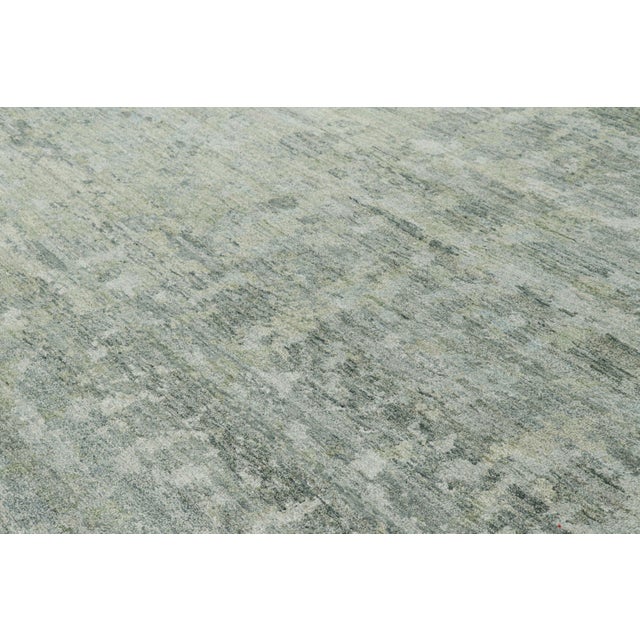 Made with hand-knotted silk, this 9x12 abstract rug is a bold new addition to the Modern Collection by Rug & Kilim. On the...