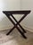 Dark mahogany finish wood butler tray table features a removable serving tray with a distinctive woven bamboo or rattan...