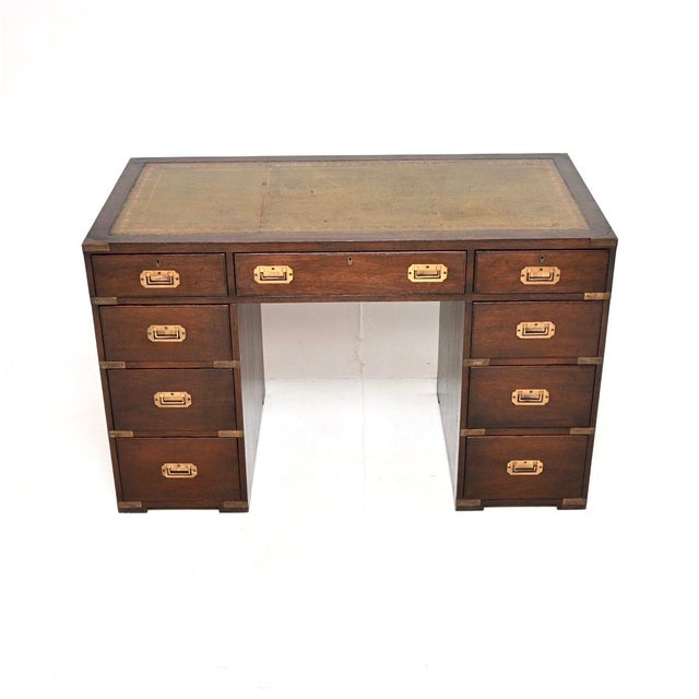A very high quality antique leather top military campaign pedestal desk. This was made in England, it dates from around...