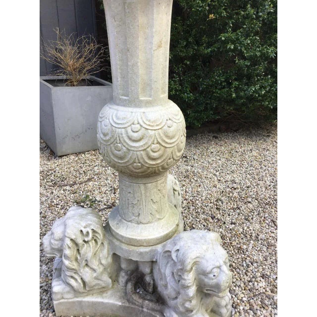 1960s carved marble lion table. Top has a griffin carved in it. Base has 3 lions on the bottom. Great for inside or out....