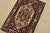 A traditional tribal Heriz rug hand-knotted with fine wool on a cotton foundation. This oriental rug features a central...