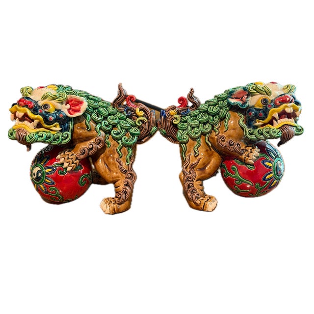 These exceptional foo dogs exemplify the refined craftsmanship characteristic of San Tao Fang production. Rendered in the...
