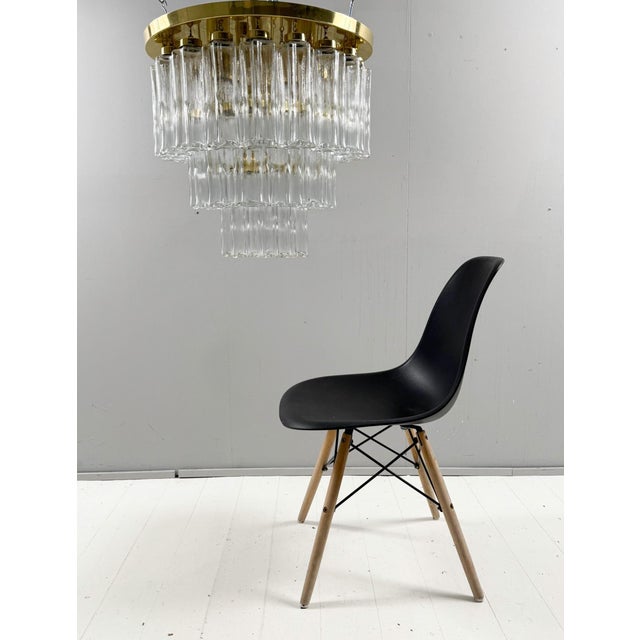 3-tier mid-century chandelier/ceiling lamp by Limburg, Germany, 1970s, solid construction made of metal and 37 transparent...