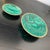 Two exquisite, decorative malachite bowls with brass rims from South Africa.
