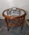 This round coffee table Is attributed to Paolo Buffa for form and style. No logo. This piece is attributed to the...