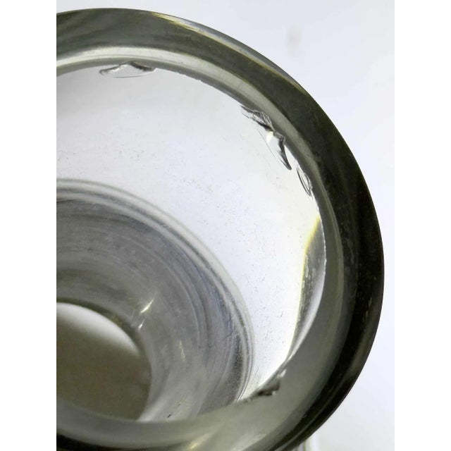 Vintage heavy crystal glass wine or liquor decanter with original stopper. Please note:The inner rim at top of the...