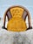Lovely pair of vintage barrel chairs. Features cane, wood and a golden velvet fabric. Perfect to add to a living room or...
