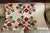 Antique late 19th / early 20th century hand sewn marriage quilt with rose wreaths. Expertly quilted in a detailed pattern....