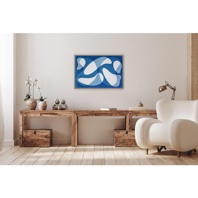 Mid-Century Shapes XIII is a captivating cyanotype monotype that draws on the visual language of mid-century abstraction....
