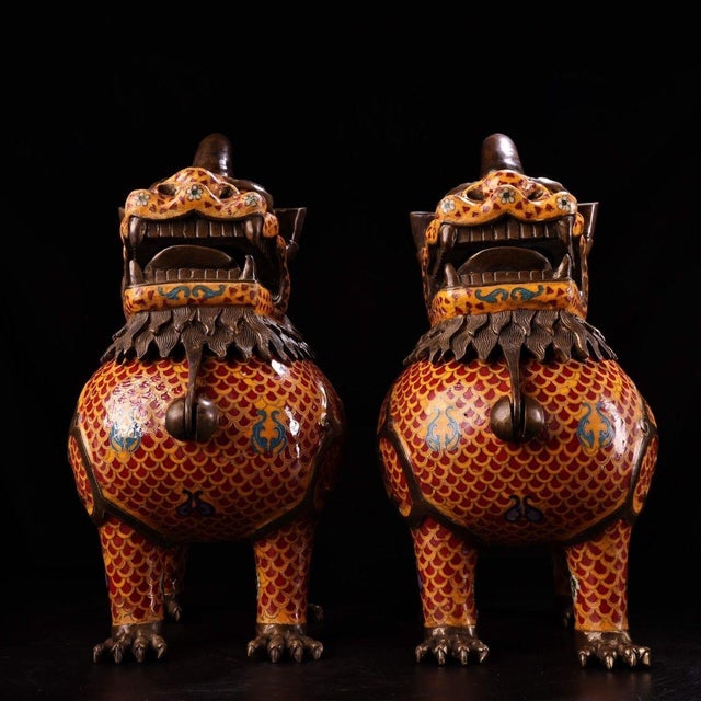 This exquisite pair of incense burners, shaped as mythical beasts (resembling the legendary Xiezhi or Qilin), showcases...