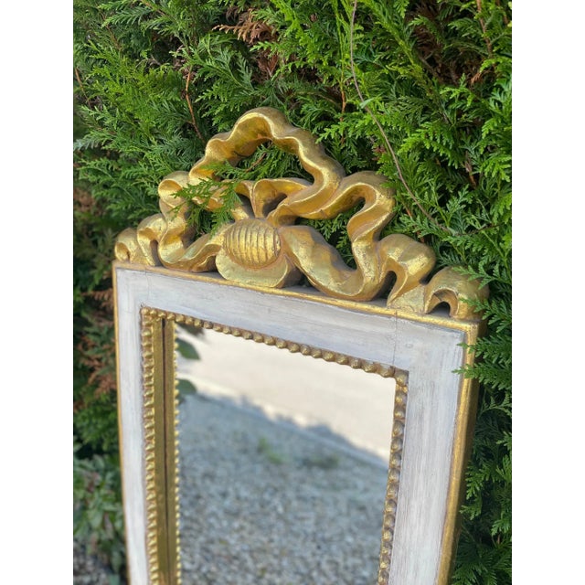 Beautiful large mirror in lacquered wood, inspired by Louis XVI furniture