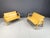 This pair of mid century benches are made out of plywood curved seats and a wooden base. The design is much like the Alvar...