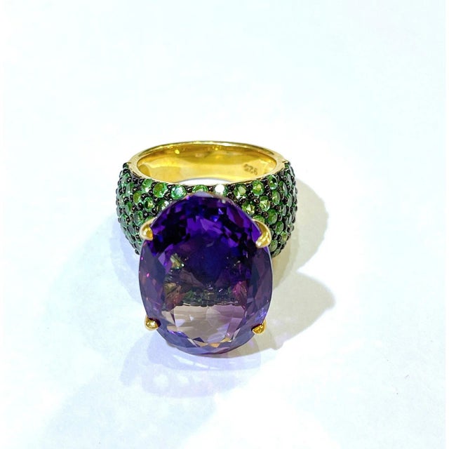 Natural Purple Amethyst - 9 Carat Natural Tsavorite - 1.50 Carat This Ring is from the "Orient" traveling collection are...