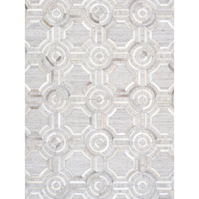 The Galaxy Collection provides a fresh take on classic geometric design. Hand-stitched by skilled artisans. These rugs are...