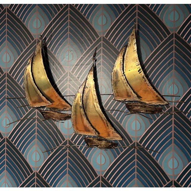 Unique wall art sculpture of three sailboats in the waves. Torched cut edges, nice patina, artist signed.