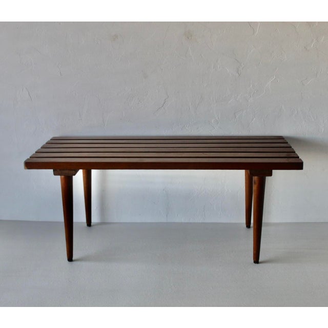 Classic vintage 1960s slat coffee table or bench. This is a versatile piece, great for more defined spaces or as an accent...