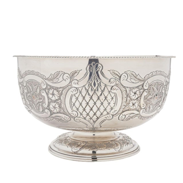 Vintage English Sheffield punch bowl & tray. The punch bowl is hand chased with repoussé images of a bounty of fruit and...
