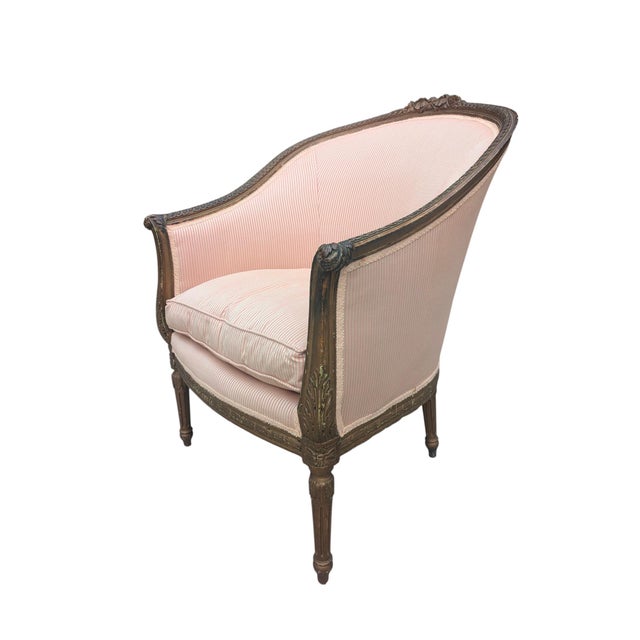 Late 19th Century French Provincial Upholstered Bergere Parlor Chair Upholstered with Light Pink and White Ticking Fabric...