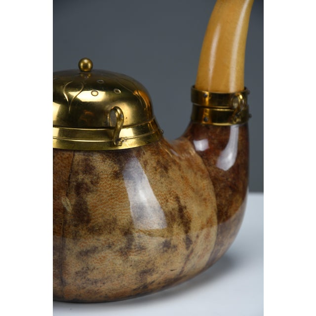 Aldo tura for macabo pipe-form tobacco & match box, lacquered goatskin and brass, italy 1950s a sculptural piece of mid-...