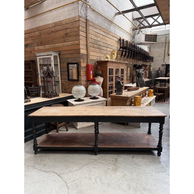 This draper's table is made of solid oak, except for the bottom shelf, which is made of fir. We have preserved its...