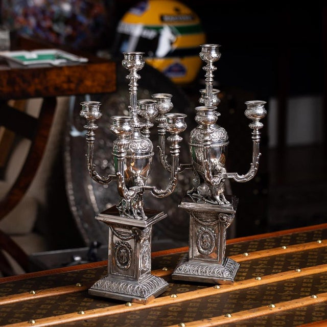 Antique 19th Century European pair of five light solid silver candelabras in the nineteenth Century revival taste,...