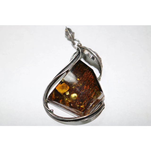 This is part of Chairish’s Fine Jewelry assortment. An enchanting huge very special fine ancient baltic amber, naturally...