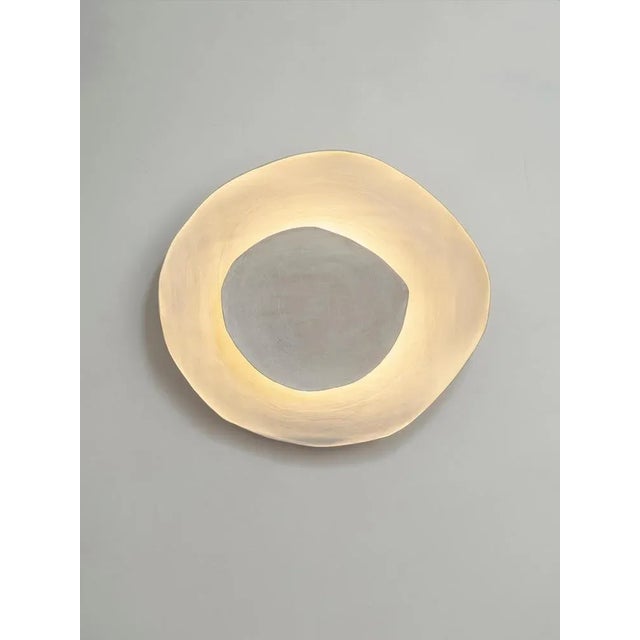 Silk #10 wall light by margaux leycuras. One of a kind, signed and numbered dimensions: ø40 x h 43 cm material: ceramic,...