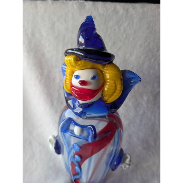 The Aesthetic: This substantial 12-inch hand-blown figurine is a classic example of mid-century Venetian whimsy. It...