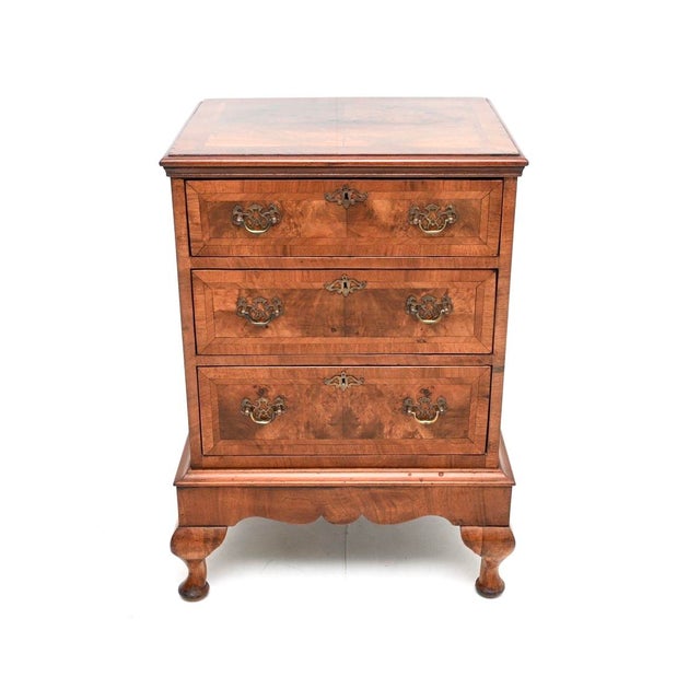 A wonderful antique burr walnut chest on legs in the Georgian style. This was made in England, it was adapted from a...