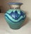 The Original John Preschutti, Graeagle Oktoberfest blue glazed pottery vase is a handmade art pottery piece from 1997....