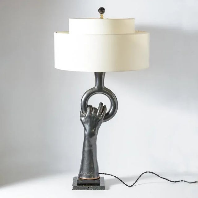 Just in, this fabulous Black Luster Finished Terracotta, Hand Sculpture Table Lamp, by Jean Marais (1913-1998) C.1960s...